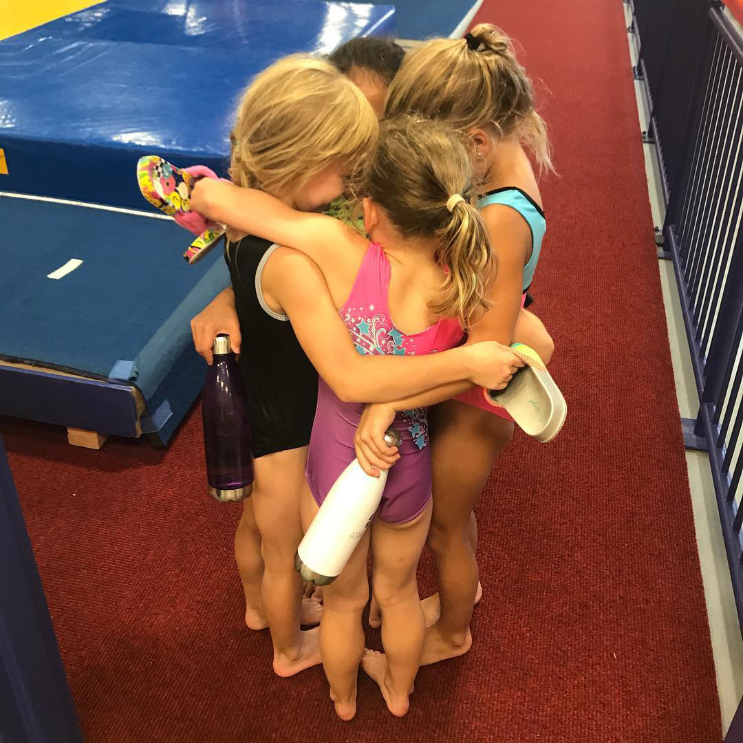little girls in a huddle